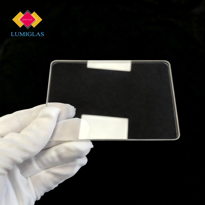 Alkali-resistant mica glass window for high pH boiler observation.